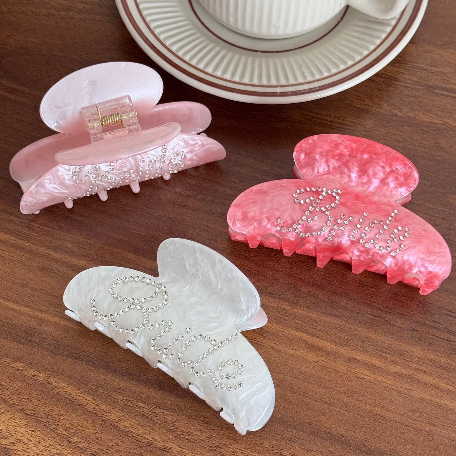 Rhinestone-encrusted acrylic hair clip