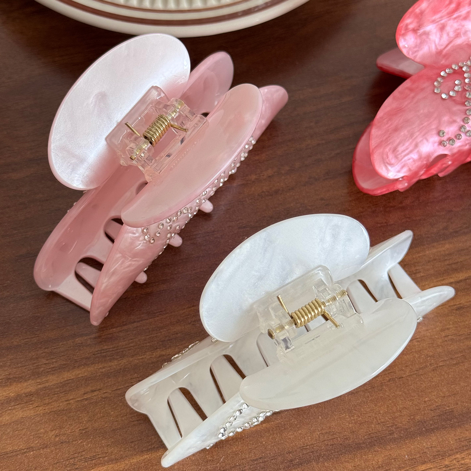 Rhinestone-encrusted acrylic hair clip