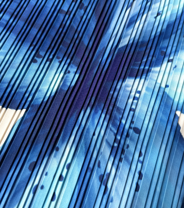 Resort-style pleated strapless dress