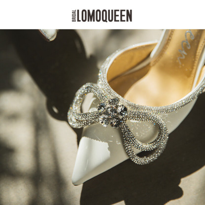 Wedding lace-up high heels.