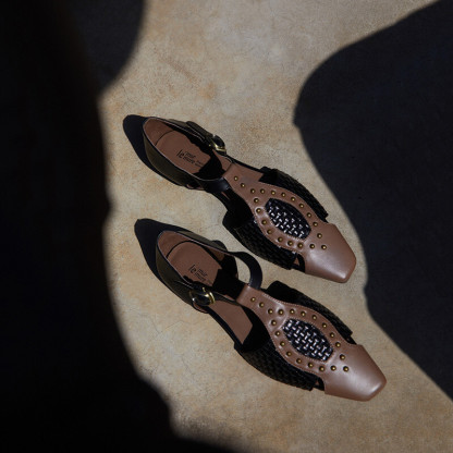 Facile studded woven sandals