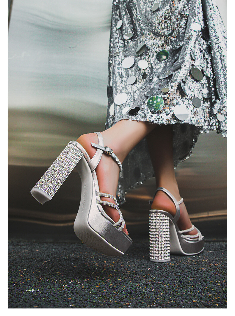 Rhinestone embellished high-heeled sandals.