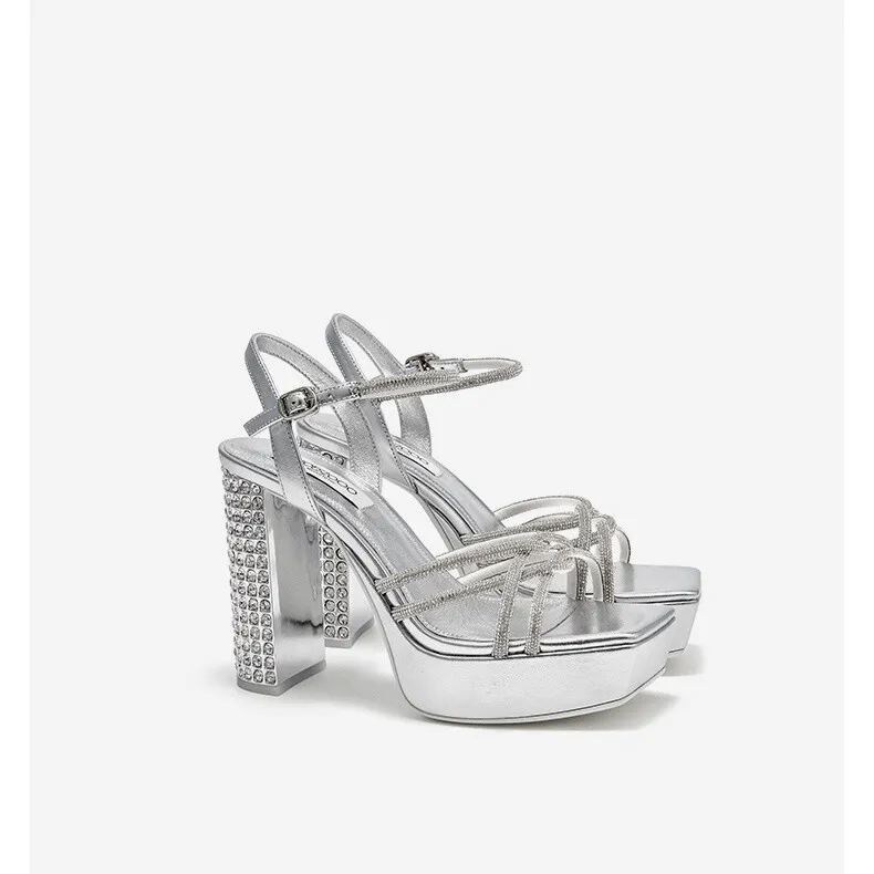 Rhinestone embellished high-heeled sandals.