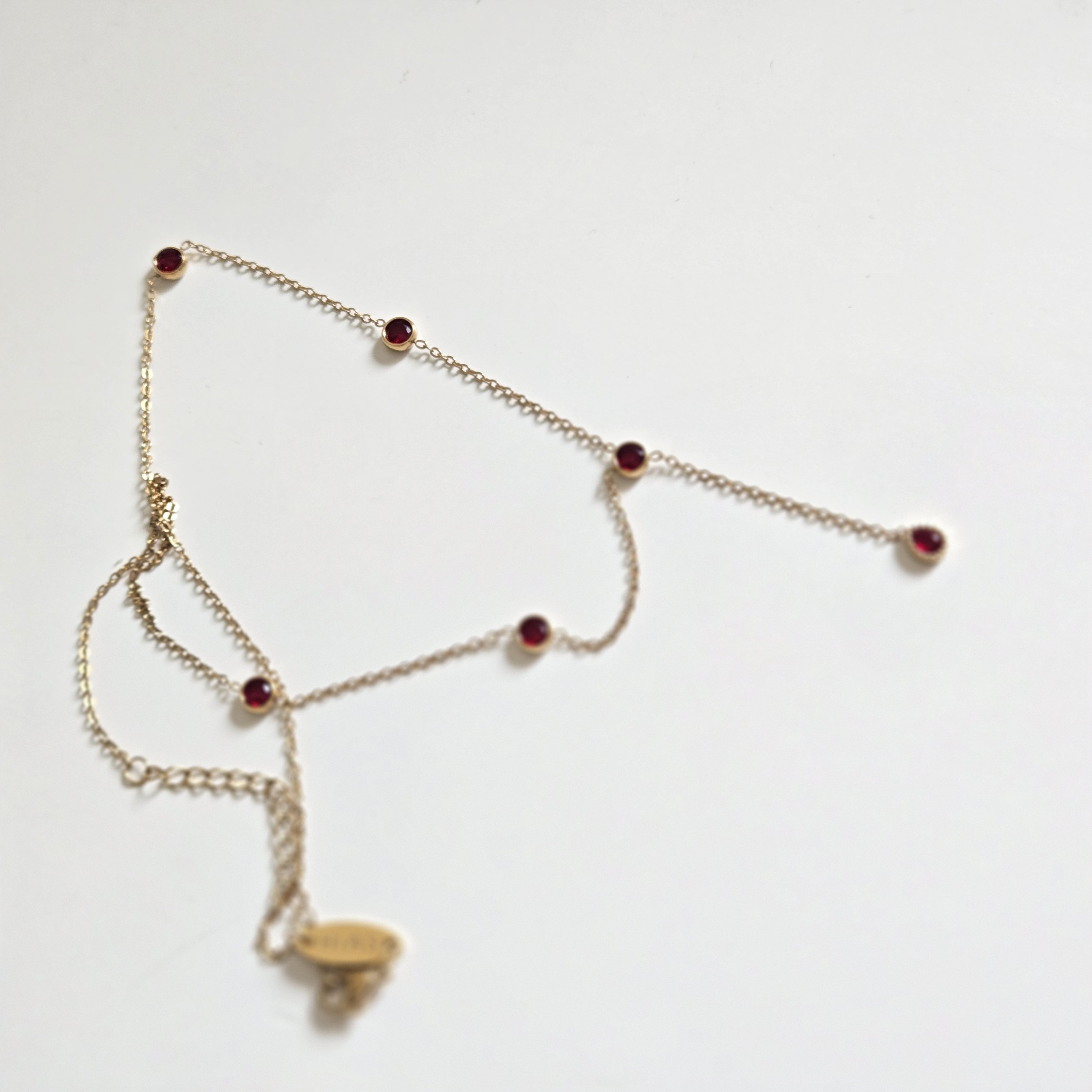 RED ZIRCON LARIAT NECKLACE GOLD