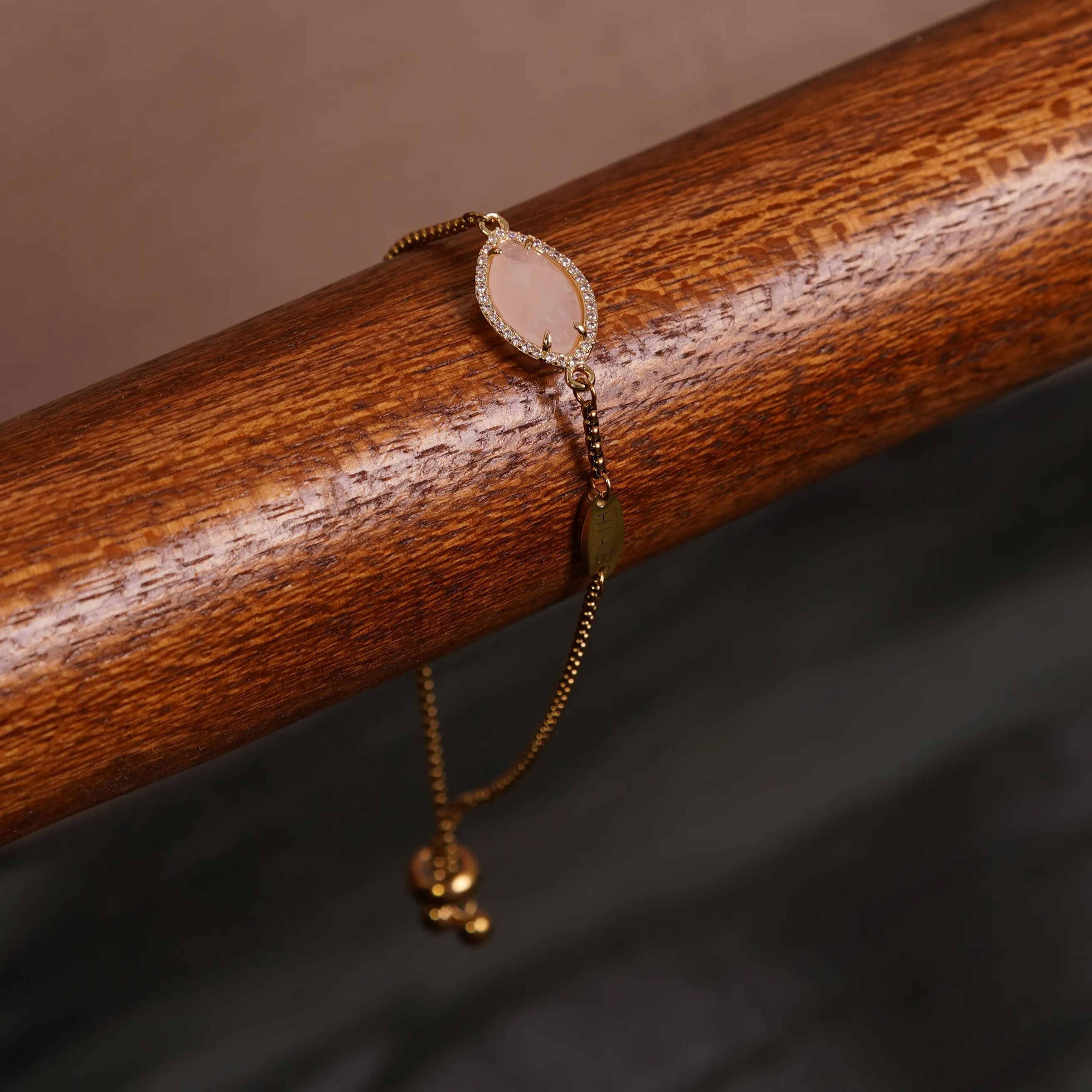 TERINDAH STATEMENT HORSE EYE ROSE QUARTZ SLIDE BRACELET GOLD