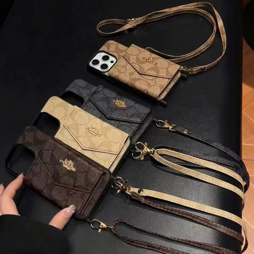 Coach手風琴款黑邊手機卡包(帶背帶)-美觀與使用結合! 專櫃皮質製作,不與地攤貨比較!