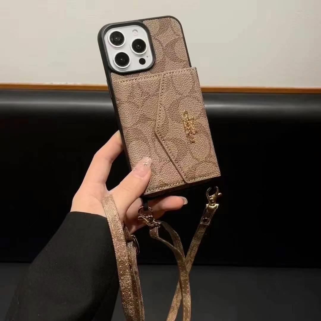 Coach手風琴款黑邊手機卡包(帶背帶)-美觀與使用結合! 專櫃皮質製作,不與地攤貨比較!