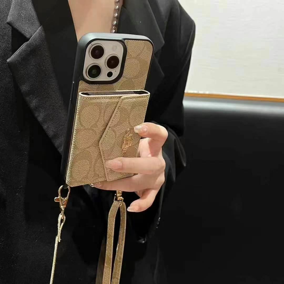 Coach手風琴款黑邊手機卡包(帶背帶)-美觀與使用結合! 專櫃皮質製作,不與地攤貨比較!