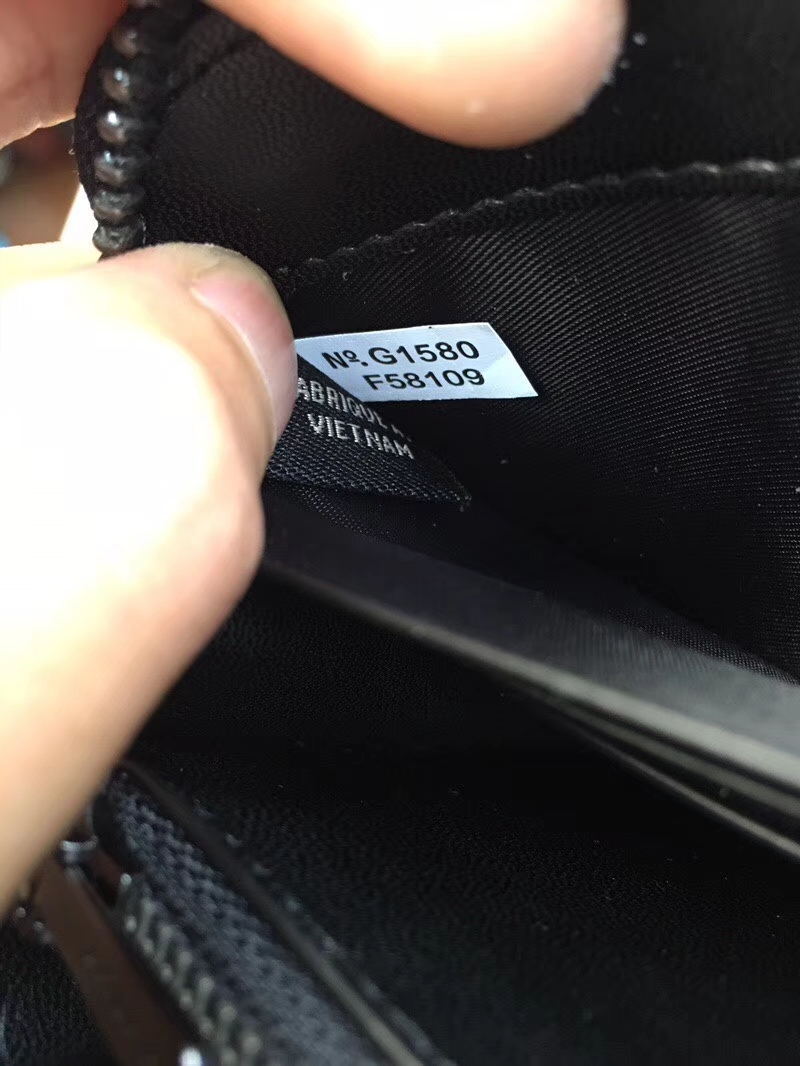 コーチ「Coach」メンズ ラウンドファスナー ロングウォレット