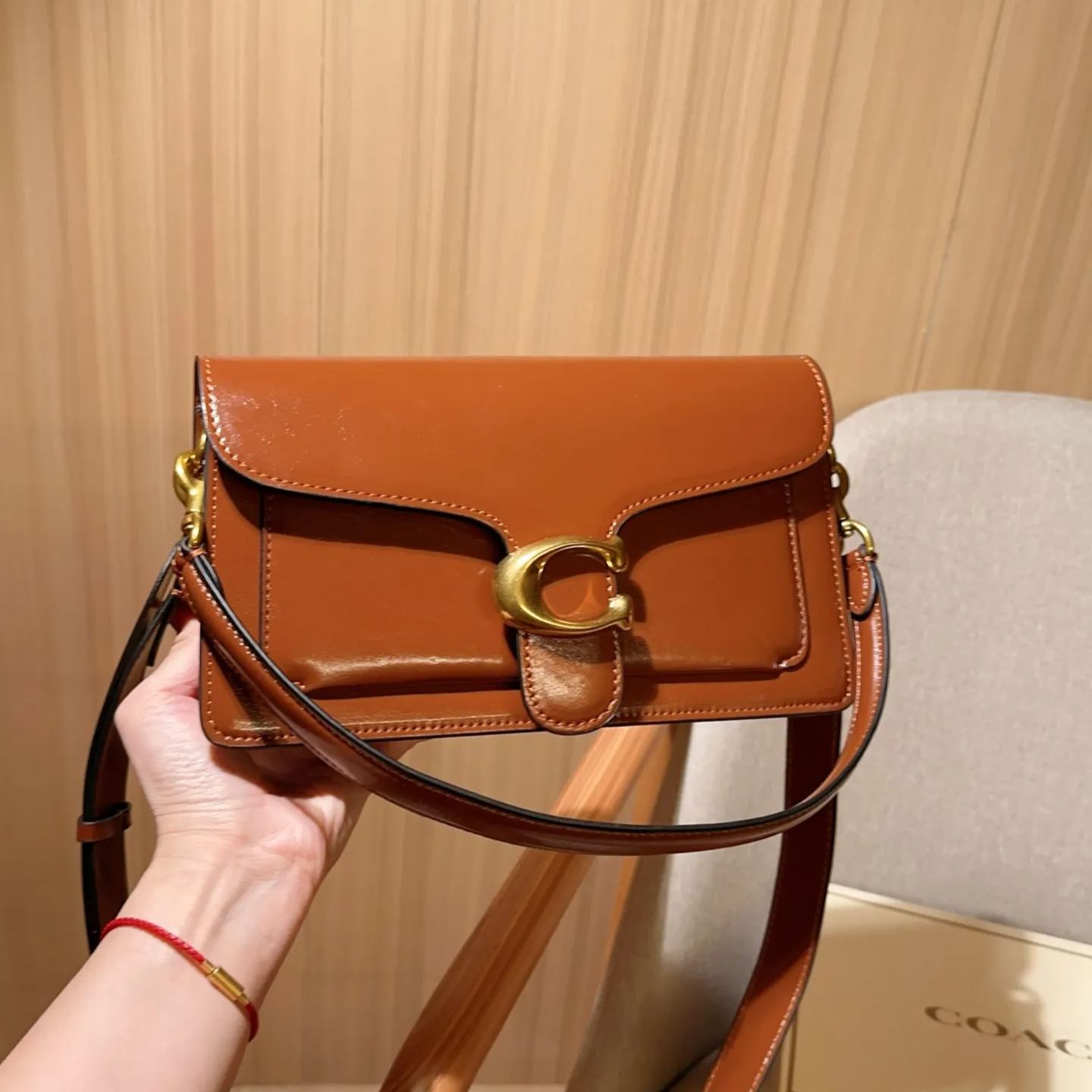 コーチ「Coach」