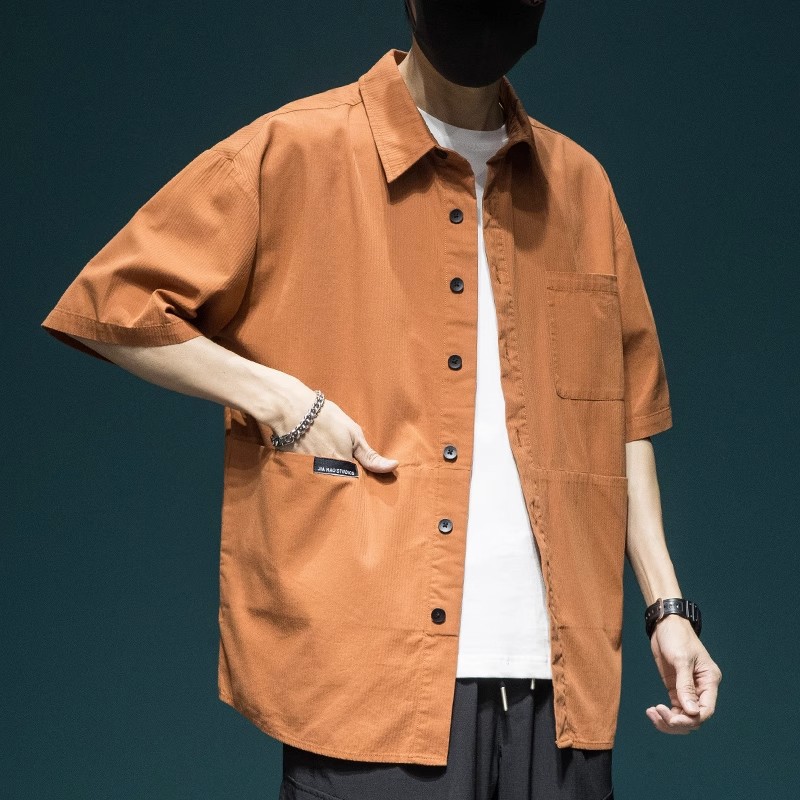 日系高級感工裝襯衫 男生夏季寬鬆翻領短袖襯衣 橘色痞帥風格上衣