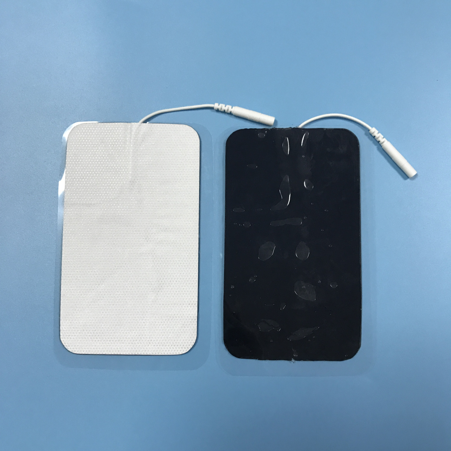 Wholesale 2.0/2.5mm tail fiber TENS, self-adhesive physical therapy, electrode pads for electrotherapy