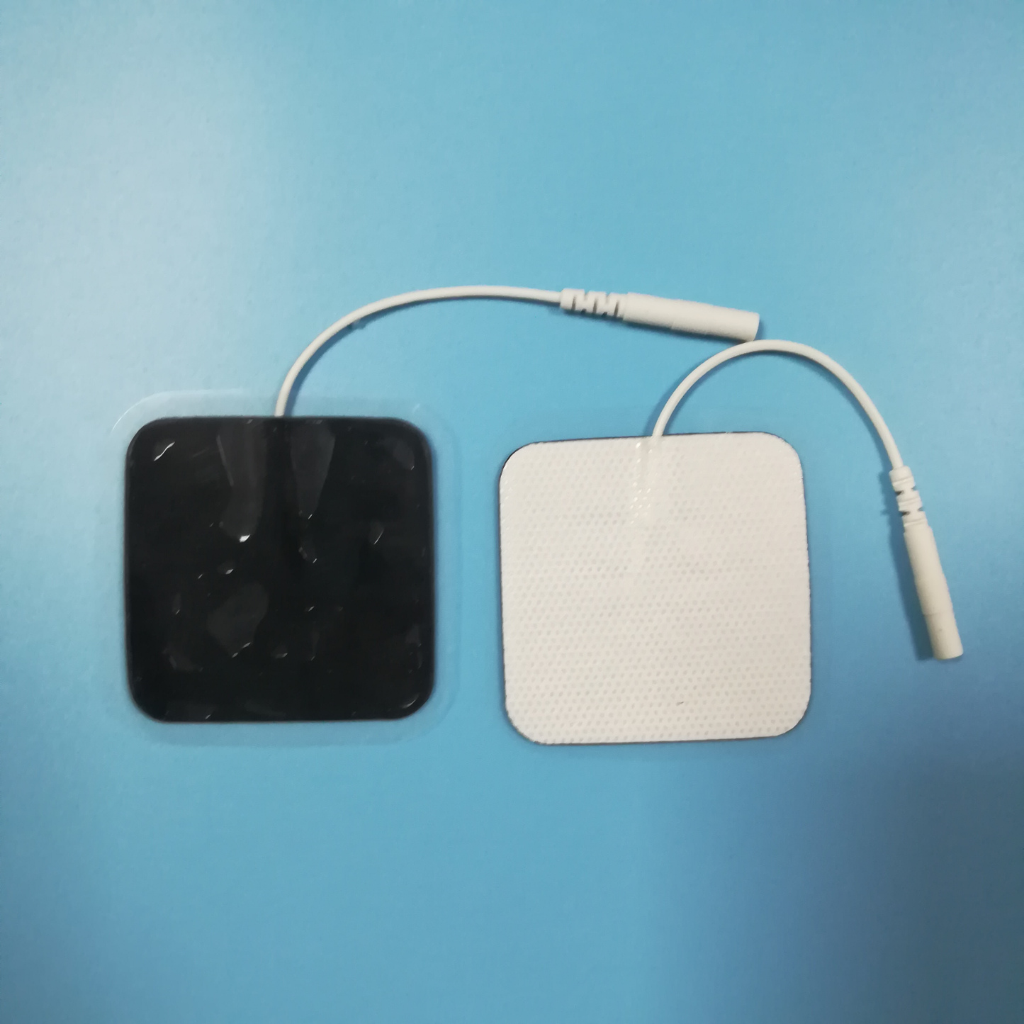 Wholesale 2.0/2.5mm tail fiber TENS, self-adhesive physical therapy, electrode pads for electrotherapy