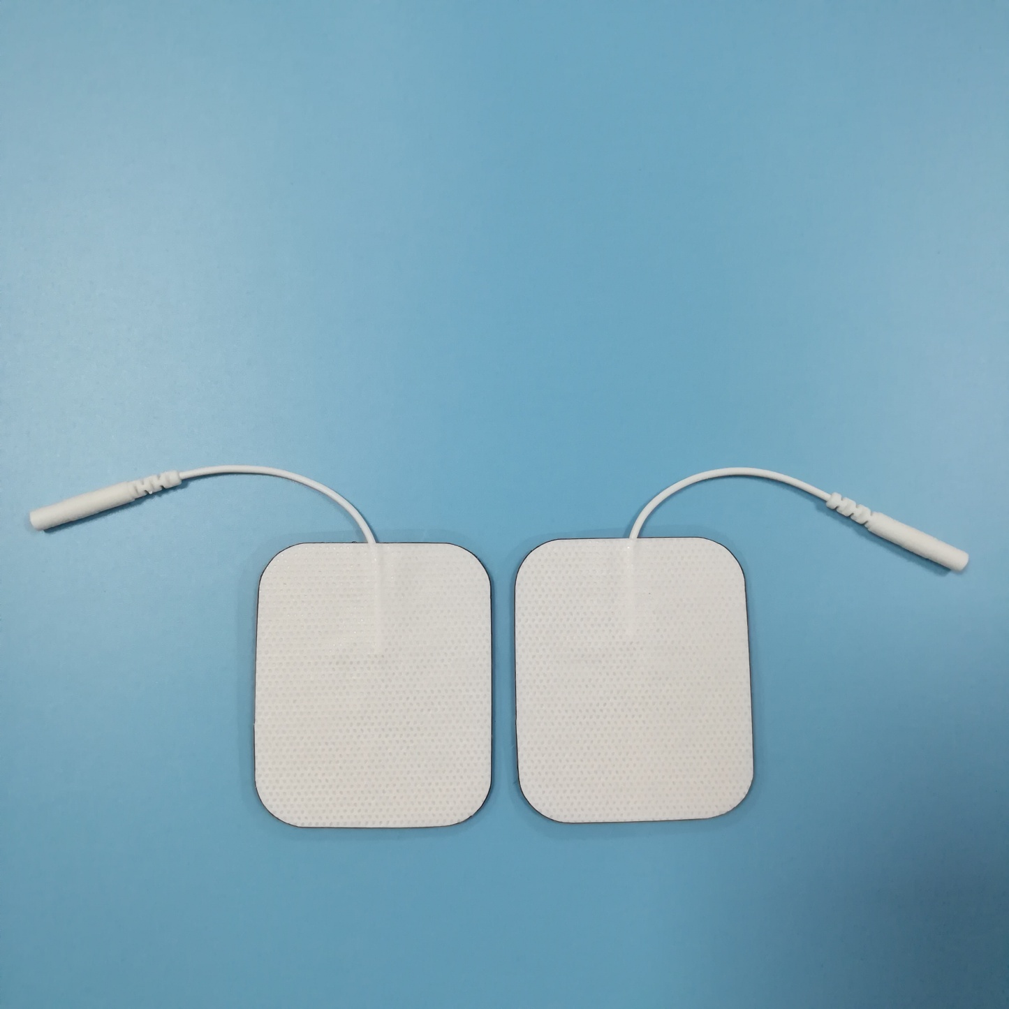Wholesale 2.0/2.5mm tail fiber TENS, self-adhesive physical therapy, electrode pads for electrotherapy