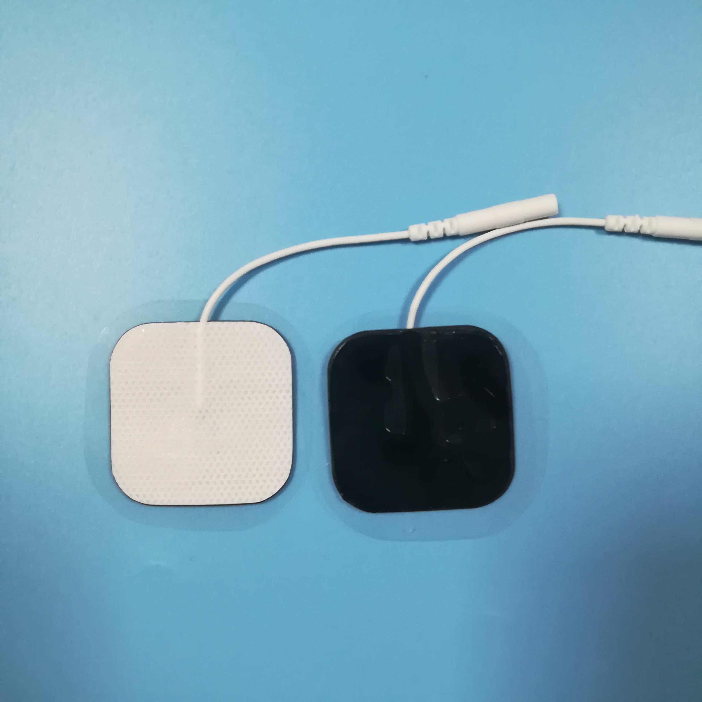 Wholesale 2.0/2.5mm tail fiber TENS, self-adhesive physical therapy, electrode pads for electrotherapy