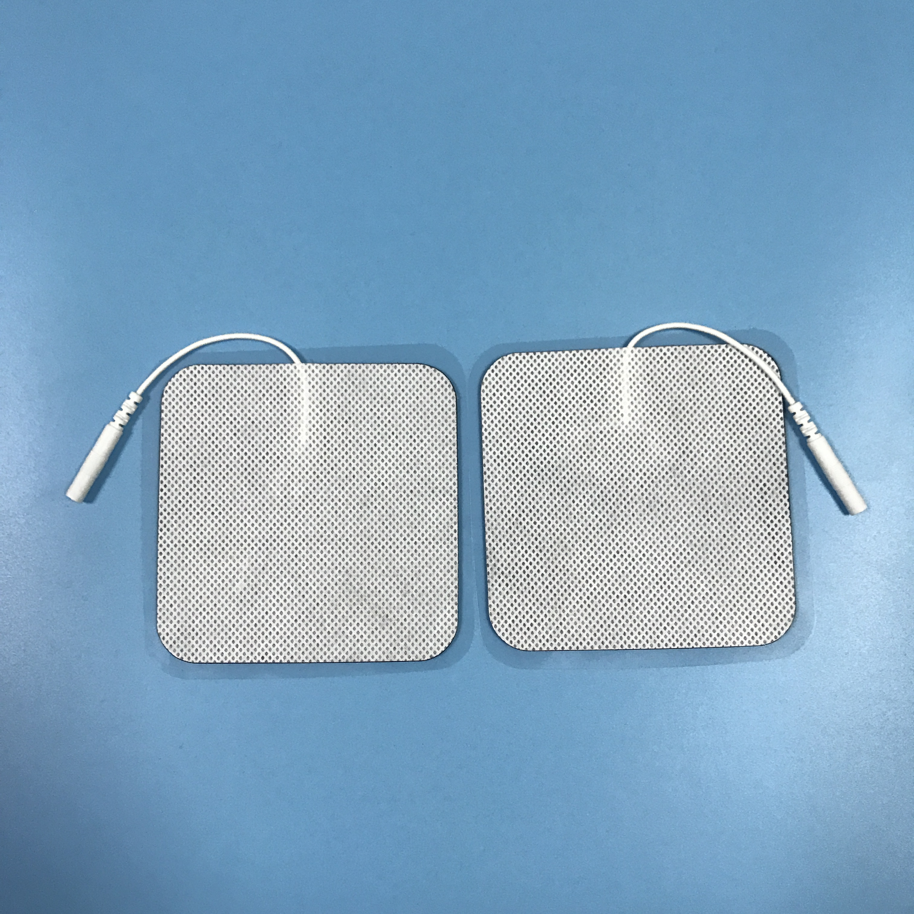 Wholesale 2.0/2.5mm tail fiber TENS, self-adhesive physical therapy, electrode pads for electrotherapy