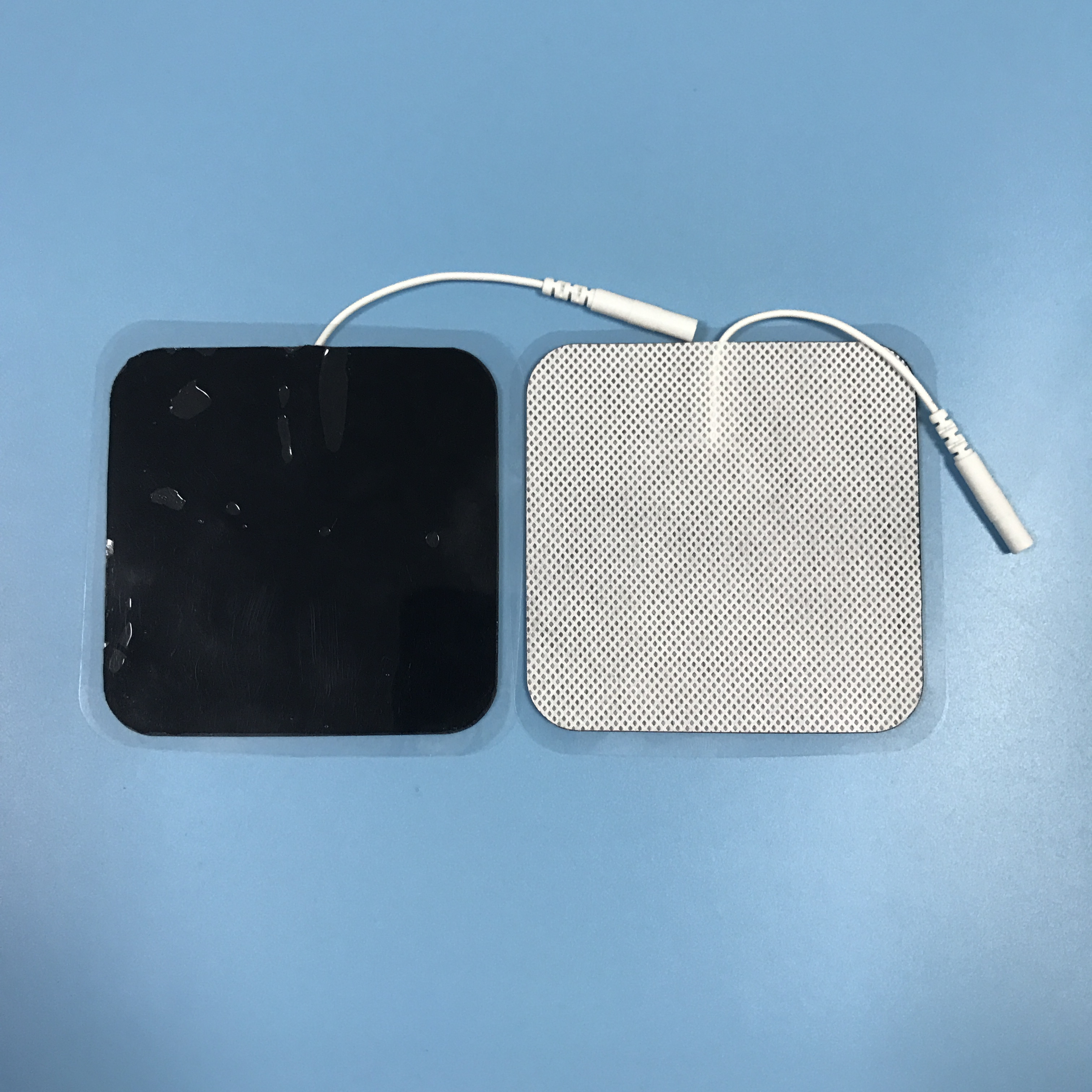 Wholesale 2.0/2.5mm tail fiber TENS, self-adhesive physical therapy, electrode pads for electrotherapy