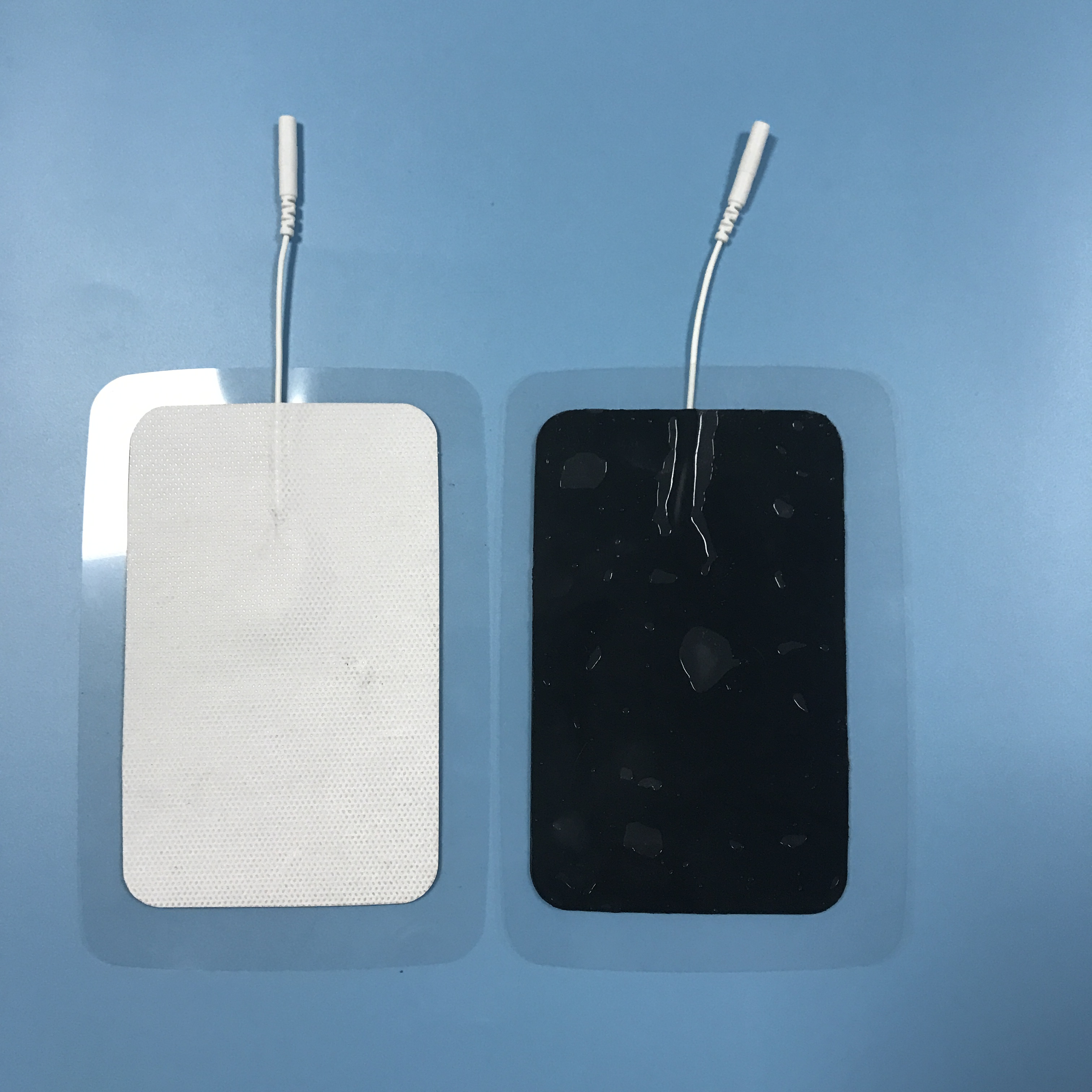 Wholesale 2.0/2.5mm tail fiber TENS, self-adhesive physical therapy, electrode pads for electrotherapy