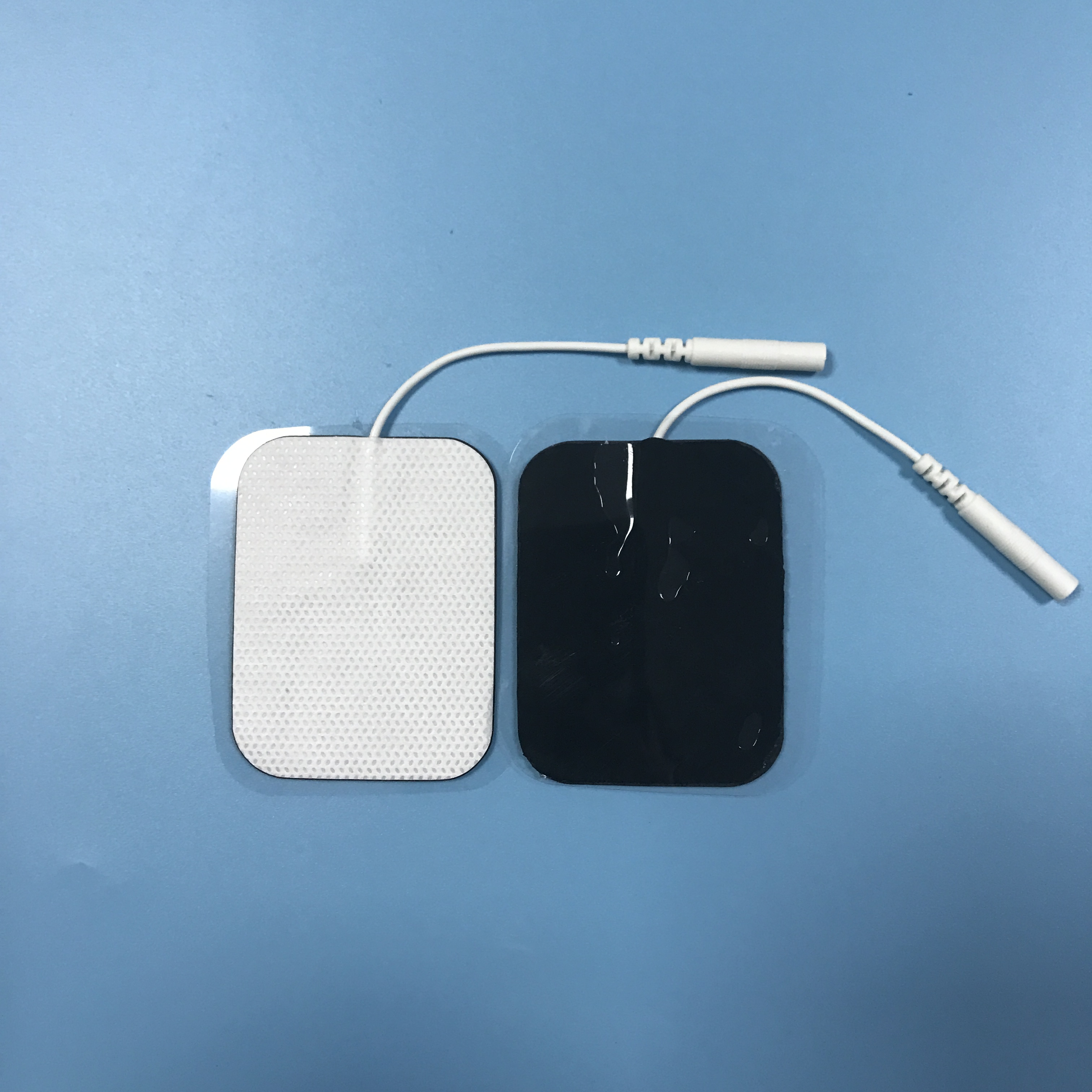 Wholesale 2.0/2.5mm tail fiber TENS, self-adhesive physical therapy, electrode pads for electrotherapy