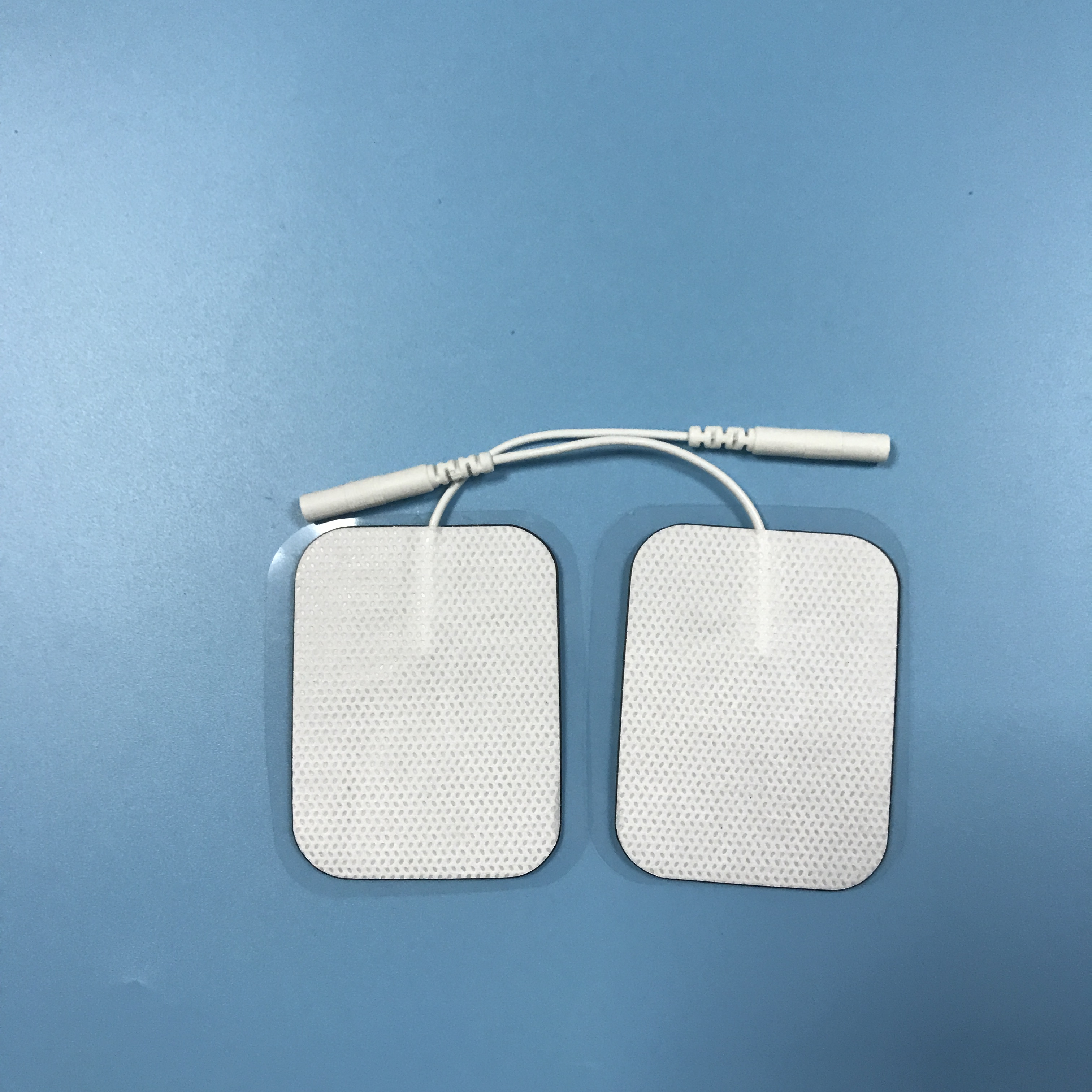 Wholesale 2.0/2.5mm tail fiber TENS, self-adhesive physical therapy, electrode pads for electrotherapy