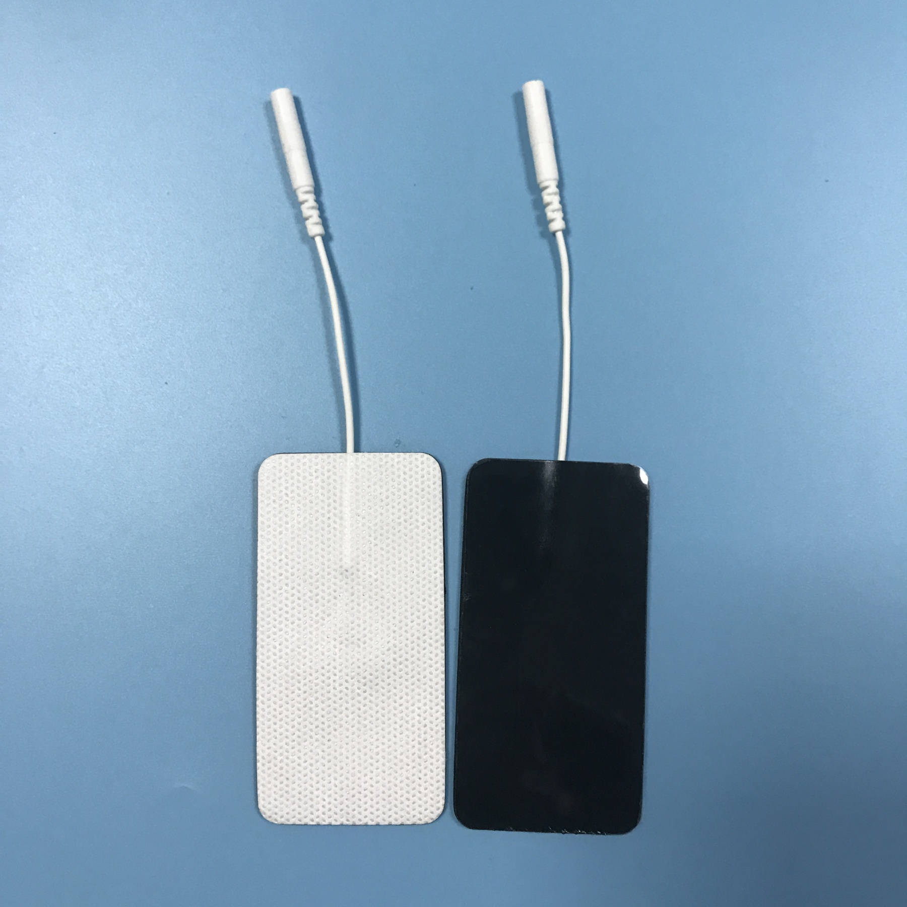 Wholesale 2.0/2.5mm tail fiber TENS, self-adhesive physical therapy, electrode pads for electrotherapy