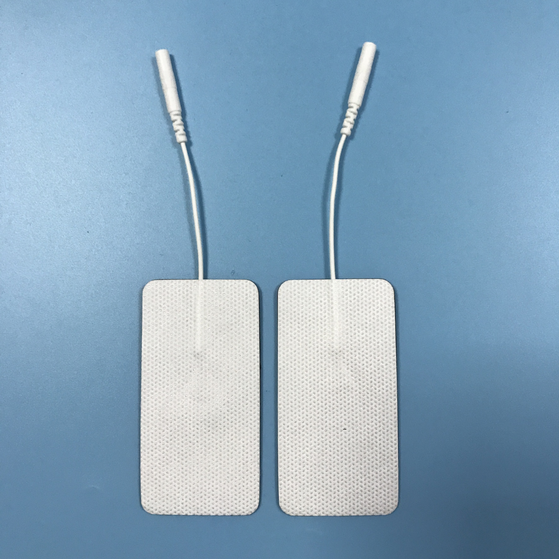 Wholesale 2.0/2.5mm tail fiber TENS, self-adhesive physical therapy, electrode pads for electrotherapy