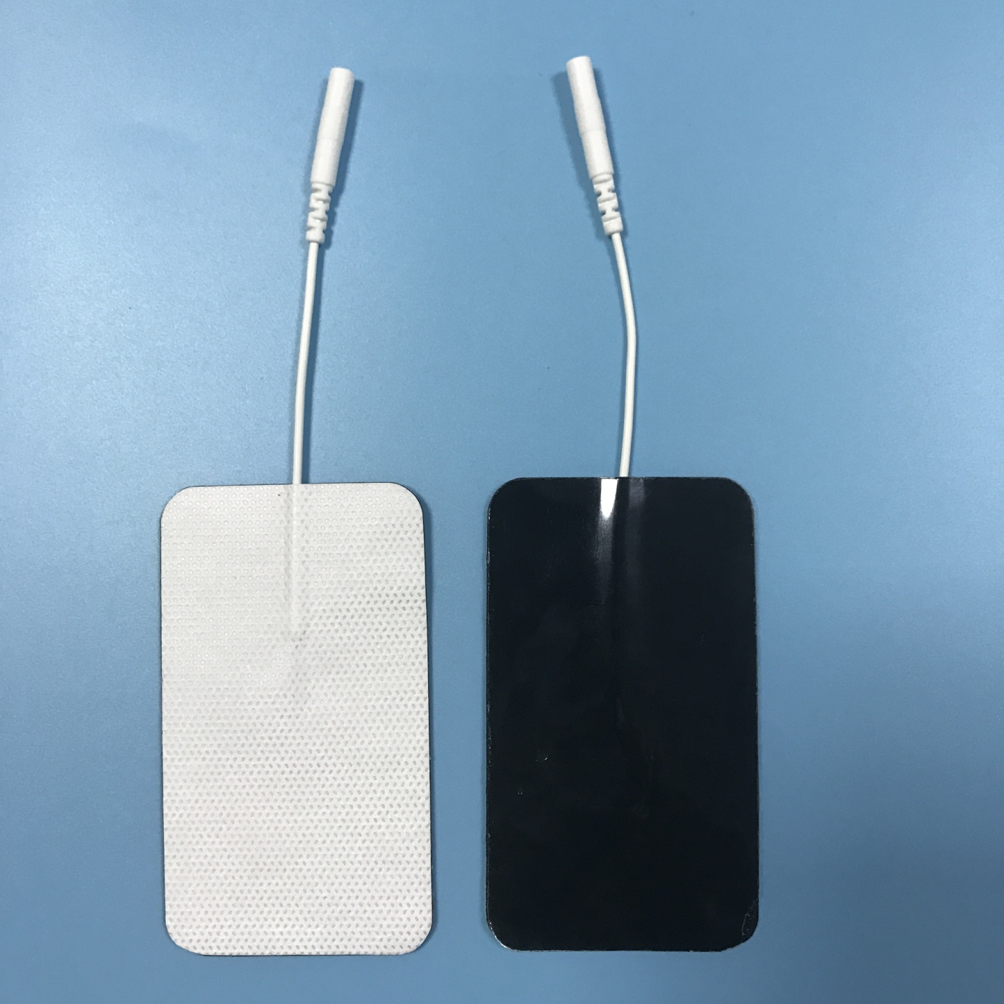 Wholesale 2.0/2.5mm tail fiber TENS, self-adhesive physical therapy, electrode pads for electrotherapy