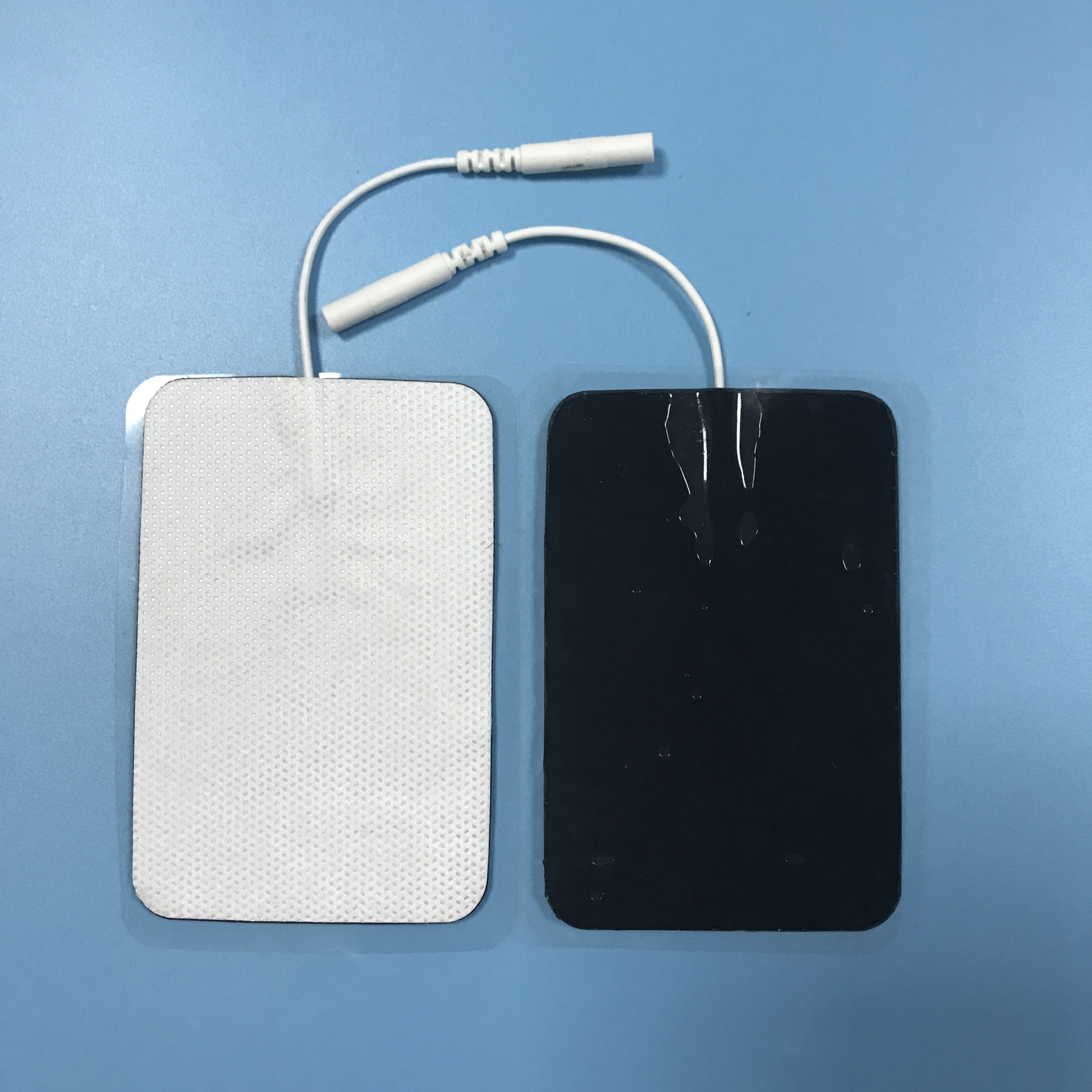 Wholesale 2.0/2.5mm tail fiber TENS, self-adhesive physical therapy, electrode pads for electrotherapy