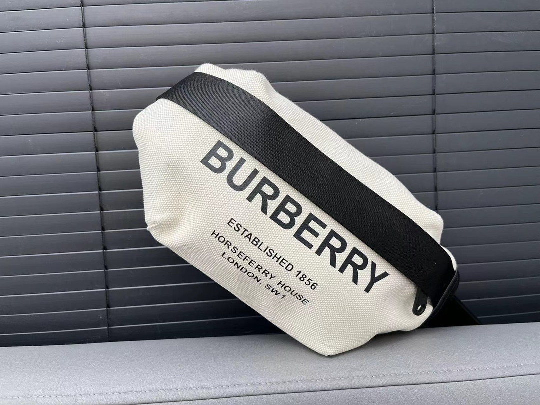 Burberry バーバリー アルファベット模様のキャンバス斜め掛けチェストバッグ、ストライプ模様のウエストバッグです。