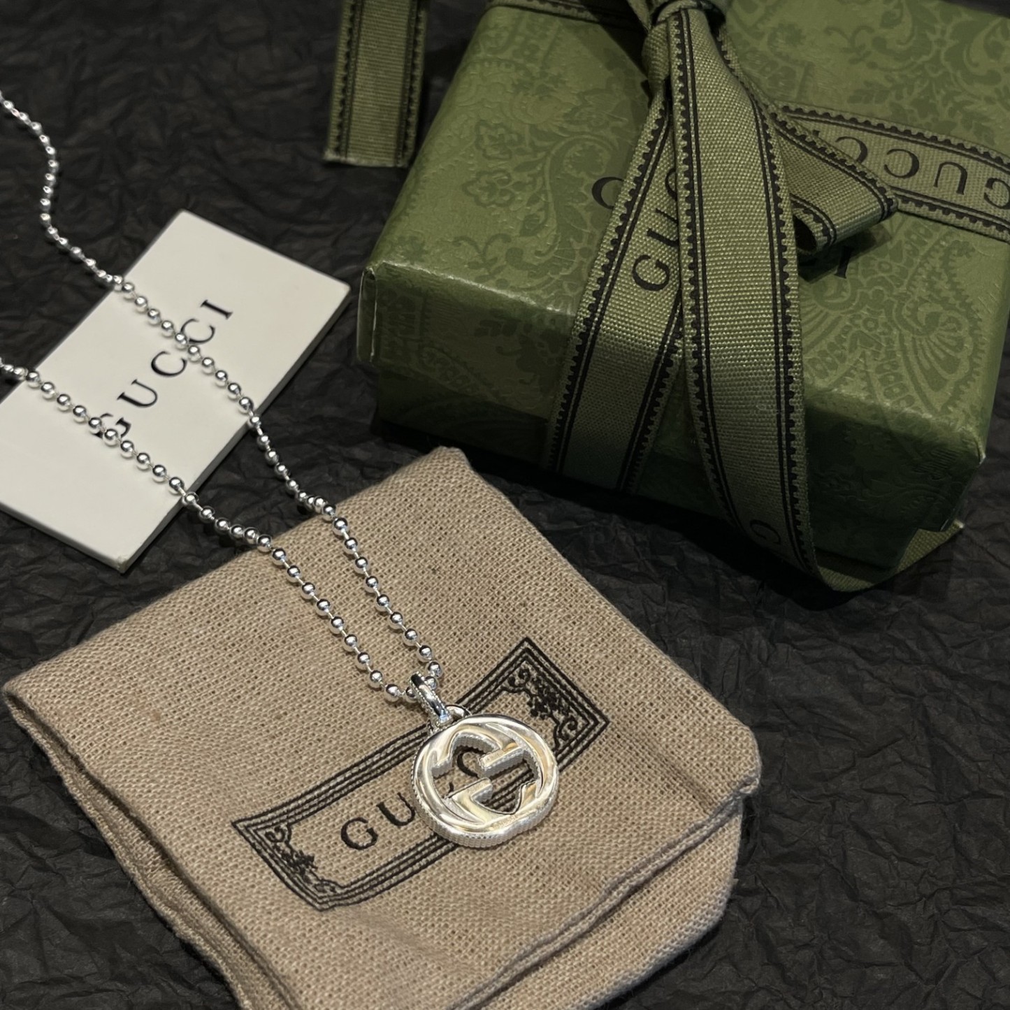 Gucci（グッチ）の interlocking のスモールサイズの玉型ビーズとダブル G のネックレス