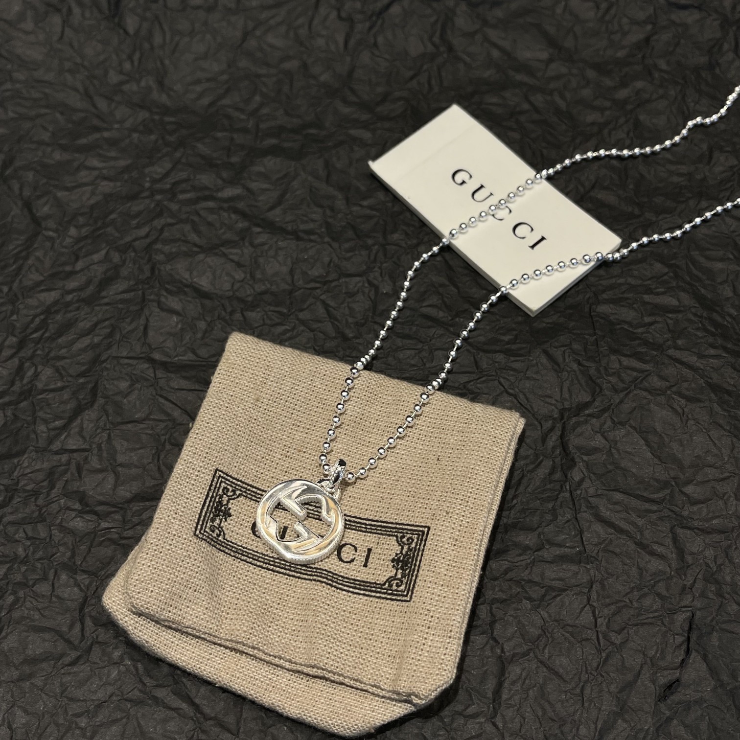 Gucci（グッチ）の interlocking のスモールサイズの玉型ビーズとダブル G のネックレス