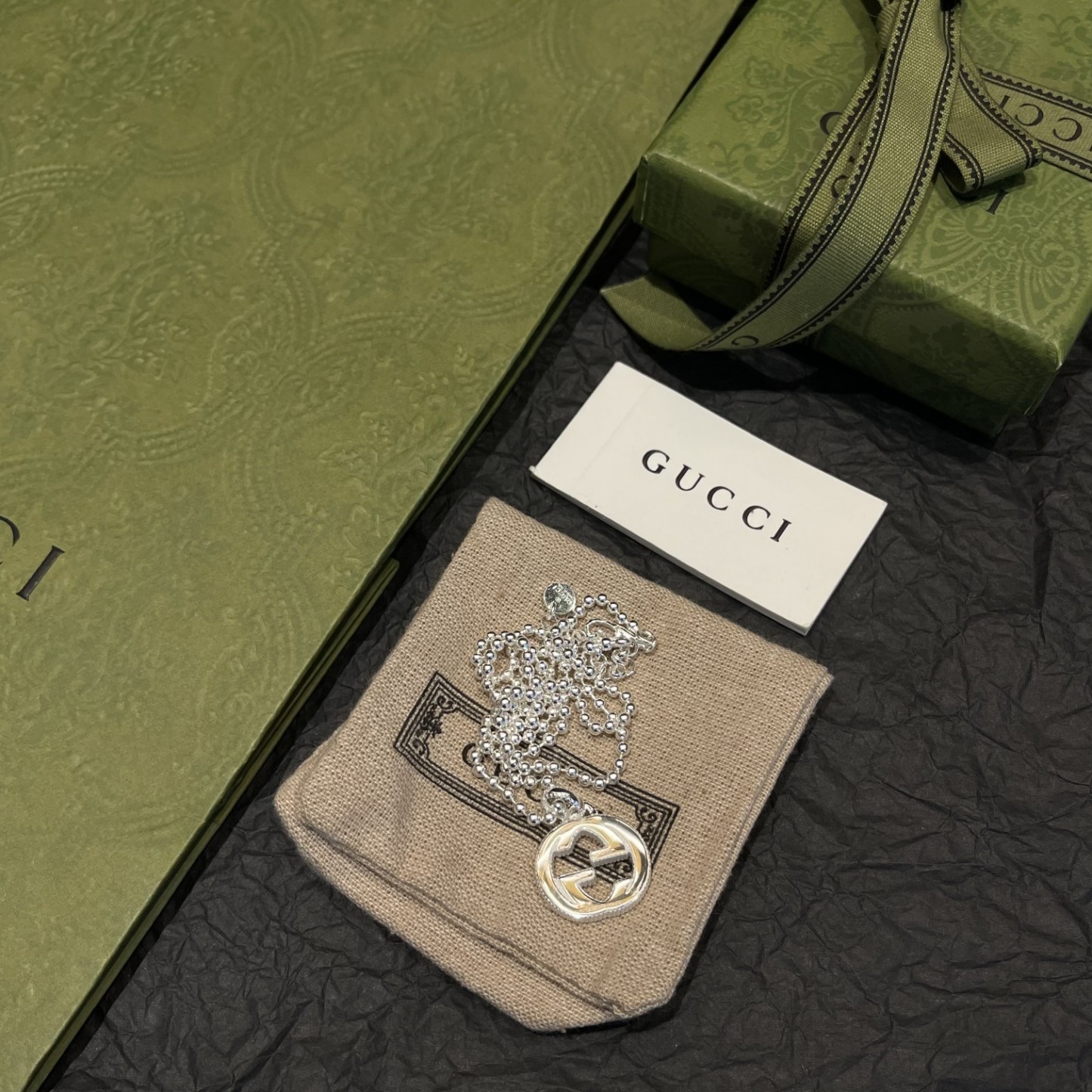 Gucci（グッチ）の interlocking のスモールサイズの玉型ビーズとダブル G のネックレス