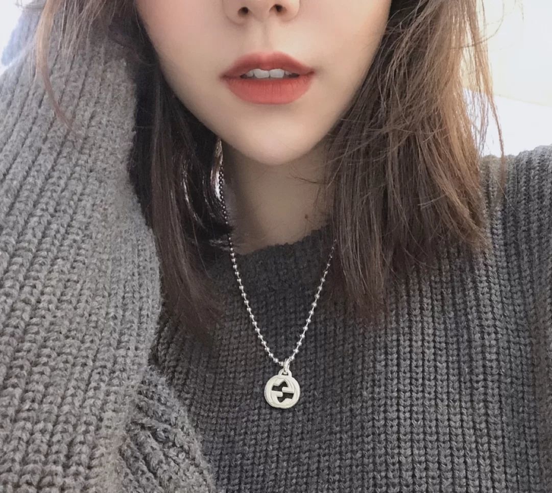 Gucci（グッチ）の interlocking のスモールサイズの玉型ビーズとダブル G のネックレス