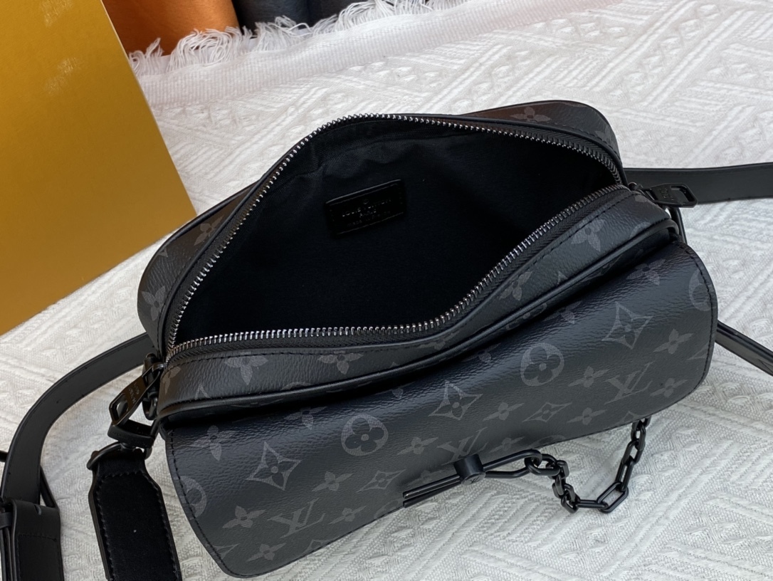 M46795、M23742 の黒いモノグラム柄の Steamer 男性用ポストマンバッグシリーズの魅力の鍵を解き明かす