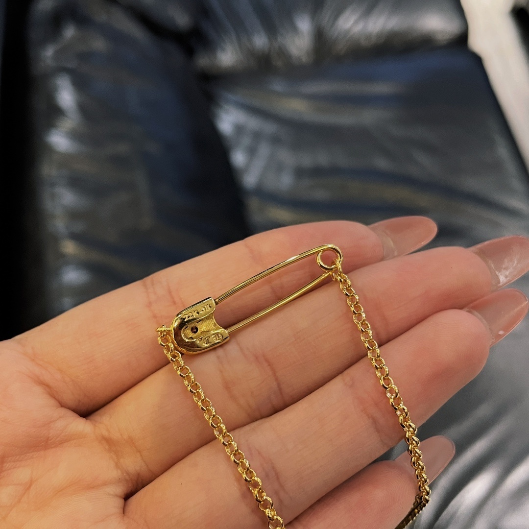 Chrome Hearts（クロム・ハーツ）の金メッキで石を飾ったピンネックレス