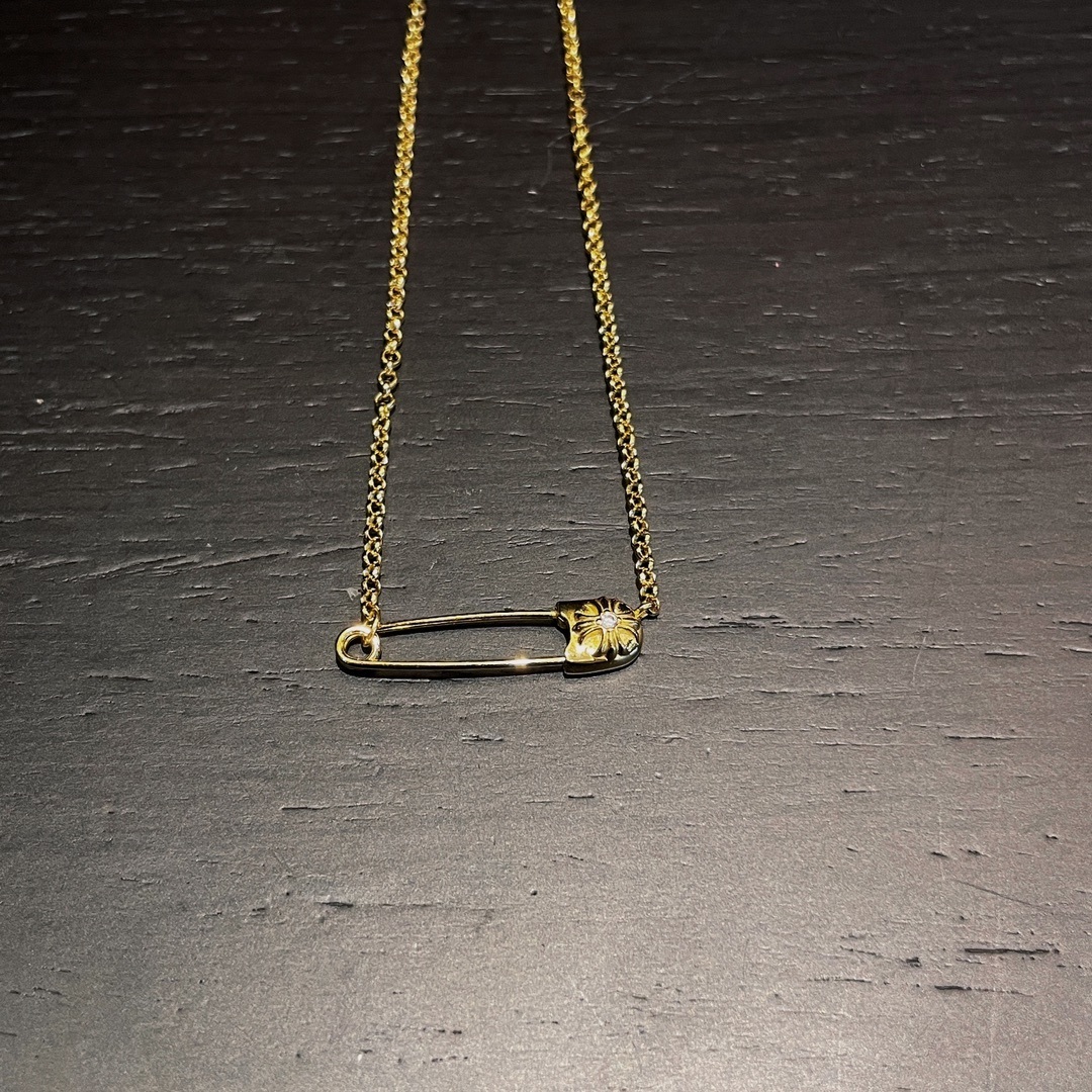 Chrome Hearts（クロム・ハーツ）の金メッキで石を飾ったピンネックレス