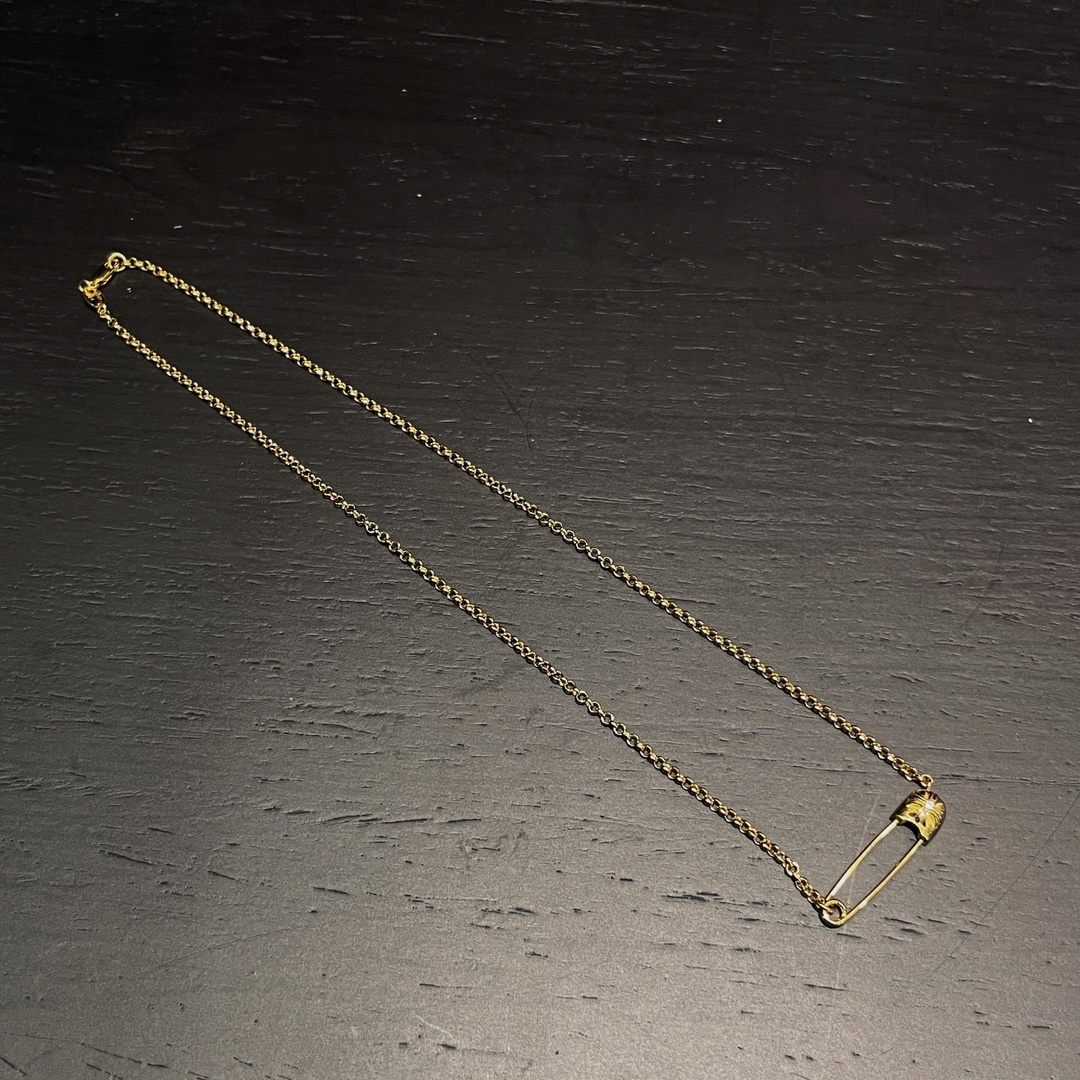 Chrome Hearts（クロム・ハーツ）の金メッキで石を飾ったピンネックレス