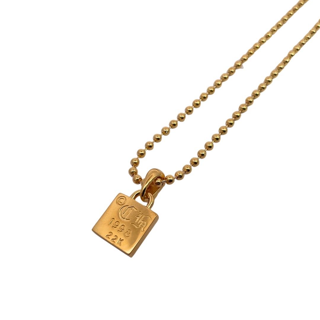 Chrome Hearts（クロム・ハーツ）の金メッキで全面に石を埋めたクロスフラワーの小さな四角形のタグ