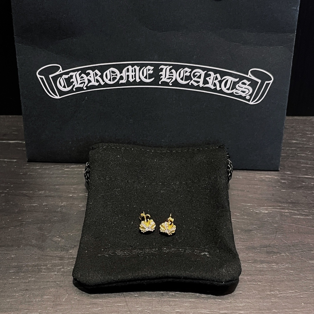 Chrome Hearts（クロム・ハーツ）の金メッキで全面に石を埋めたクロスフラワーイヤリング
