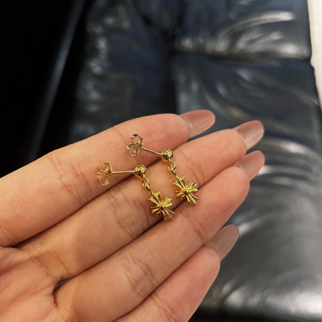 Chrome Hearts (クロム・ハーツ) の金メッキで石を埋めたシングルクロスフラワーイヤリング