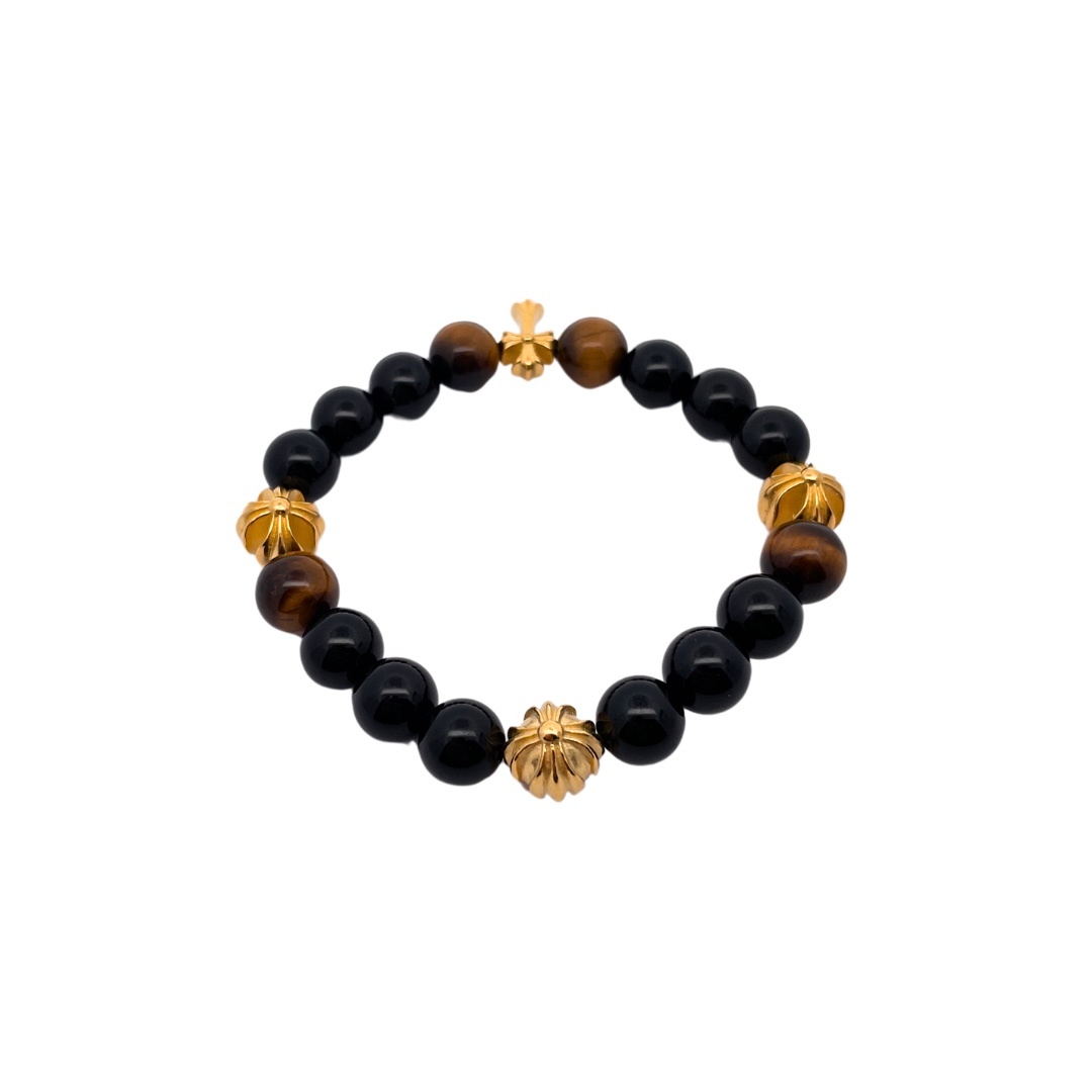 Chrome Hearts（クロム・ハーツ）のクロスモチーフの黒瑪瑙と琥珀石入りのハンドブレスレット