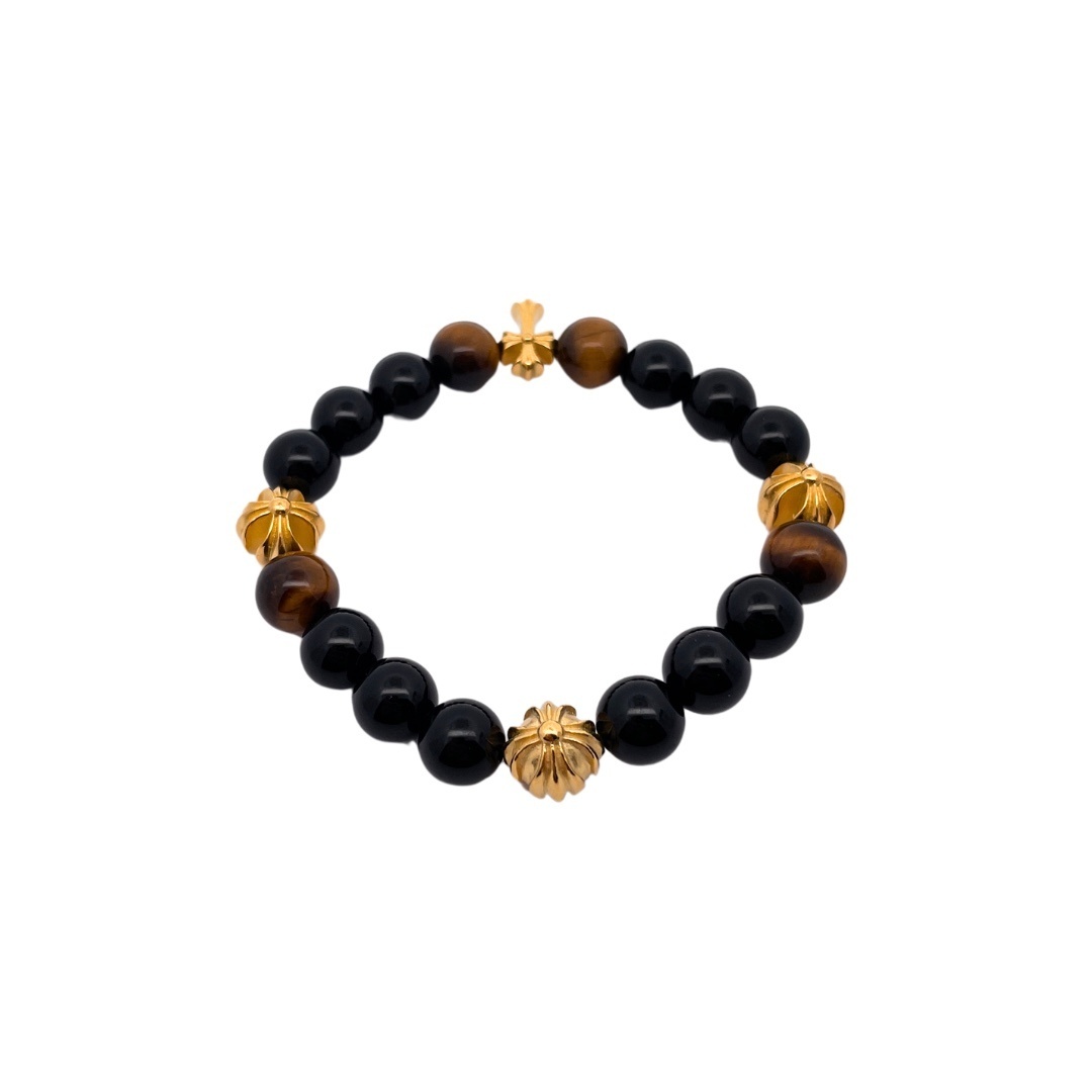 Chrome Hearts（クロム・ハーツ）のクロスモチーフの黒瑪瑙と琥珀石入りのハンドブレスレット