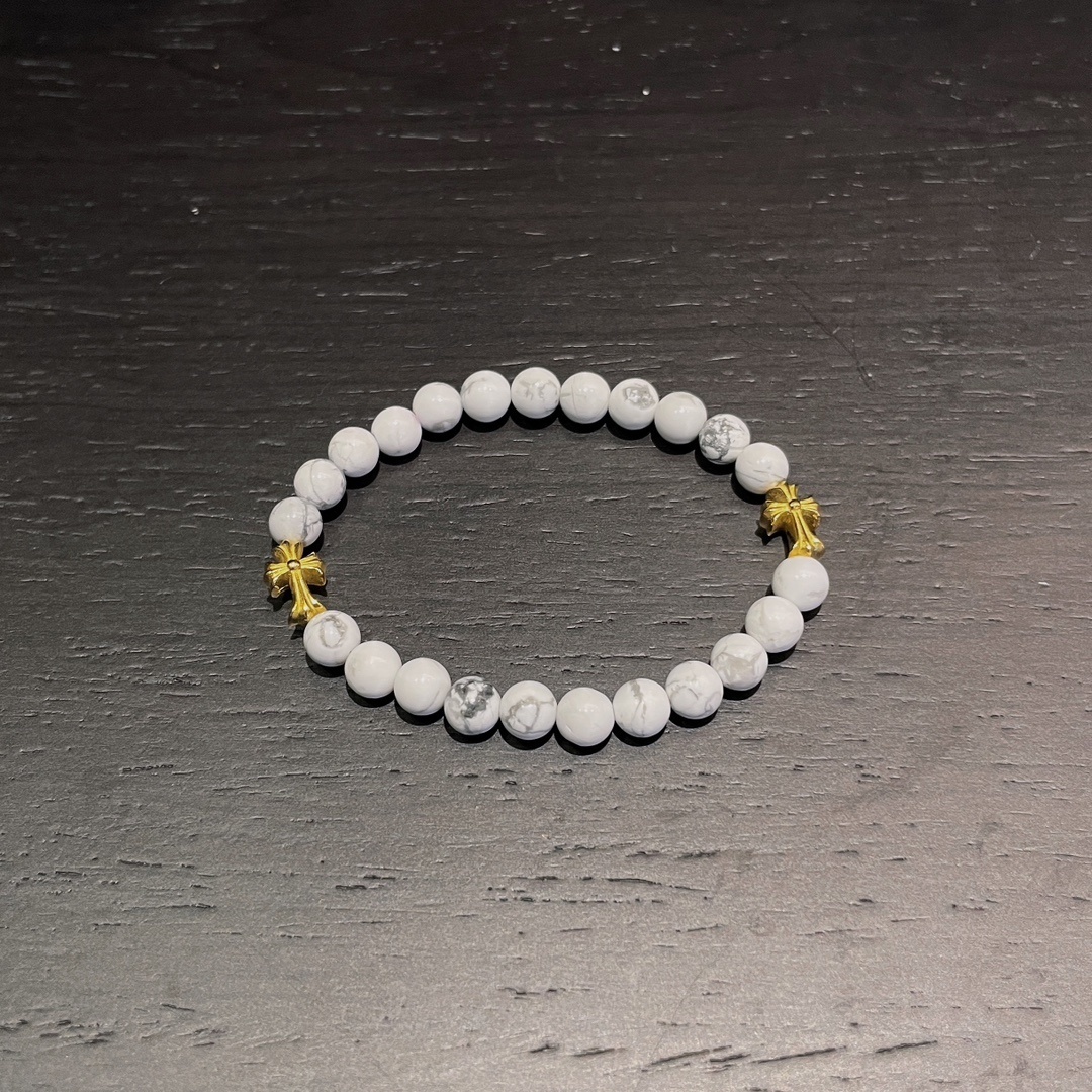 Chrome Hearts（クロム・ハーツ）のクロスモチーフの金メッキ白瑪瑙入りハンドブレスレット