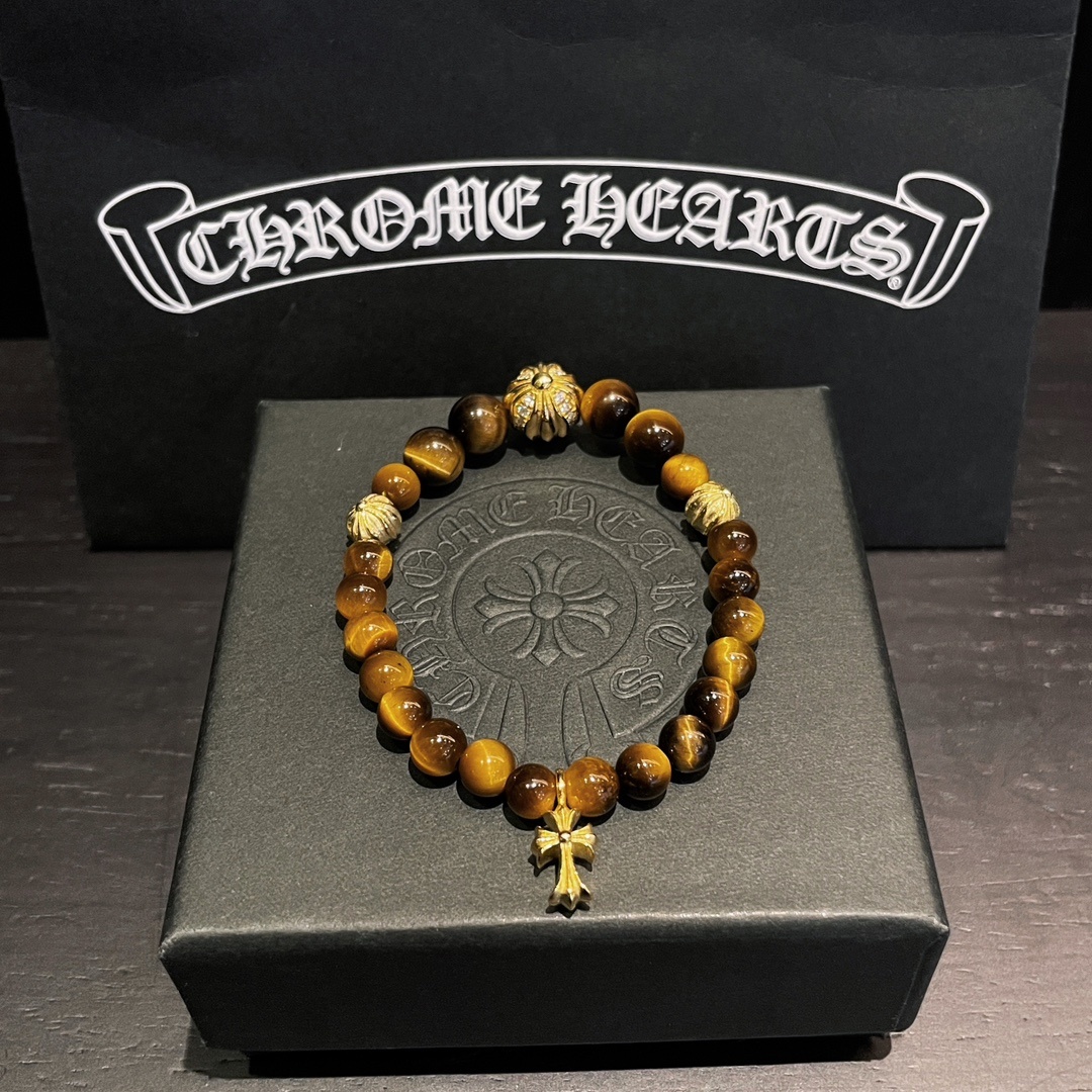 Chrome Hearts（クロム・ハーツ）のクロスモチーフの金メッキアンバー入りハンドブレスレット