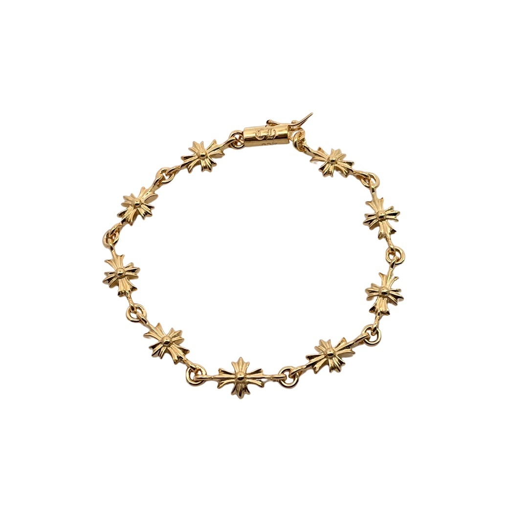 Chrome Hearts（クロム・ハーツ）の金メッキのグリーンダイヤモンドを飾った十字架ブレスレット