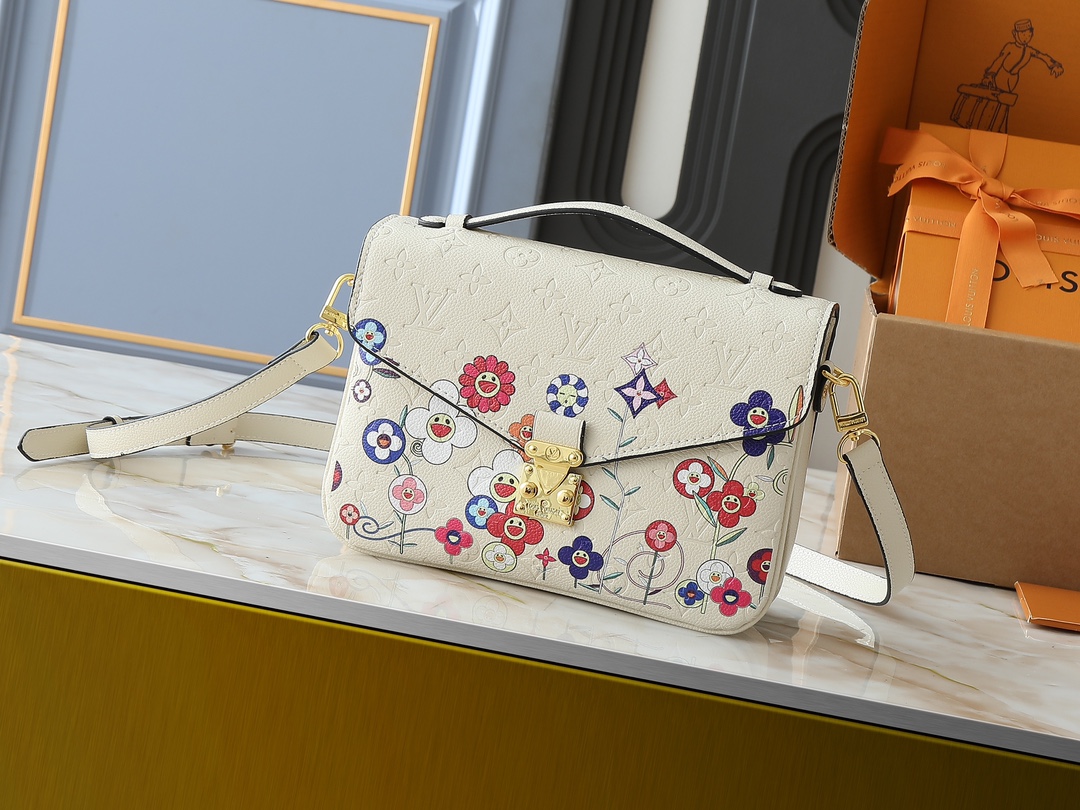 アップグレード オリジナル版 M40780 M41487 村上隆とのコラボレーション モデルのPOCHETTE MÉTIS ハンドバッグ Pochette Métis ハンドバッグは、控えめでありながら工夫が凝らされたデザインで、クラシックなカンパス バッグを演じています。