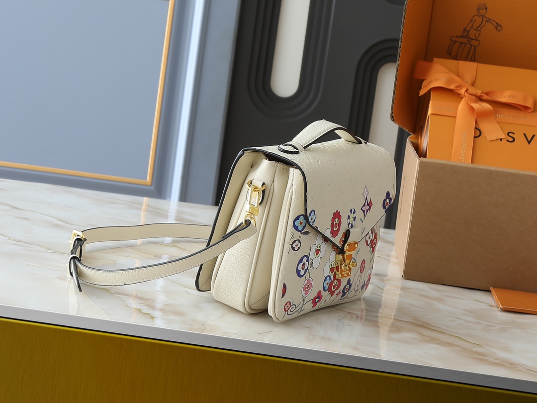 アップグレード オリジナル版 M40780 M41487 村上隆とのコラボレーション モデルのPOCHETTE MÉTIS ハンドバッグ Pochette Métis ハンドバッグは、控えめでありながら工夫が凝らされたデザインで、クラシックなカンパス バッグを演じています。