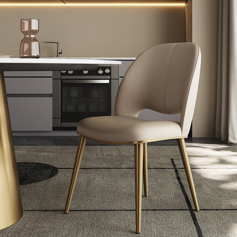 Nordic Curved Upholstered Leather Steel Dining Chair — Gold