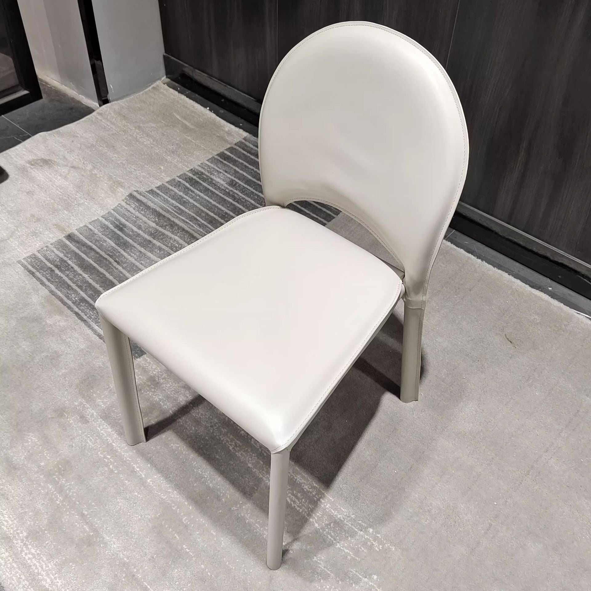 Minimalist Saddle Leather Steel Dining Chair