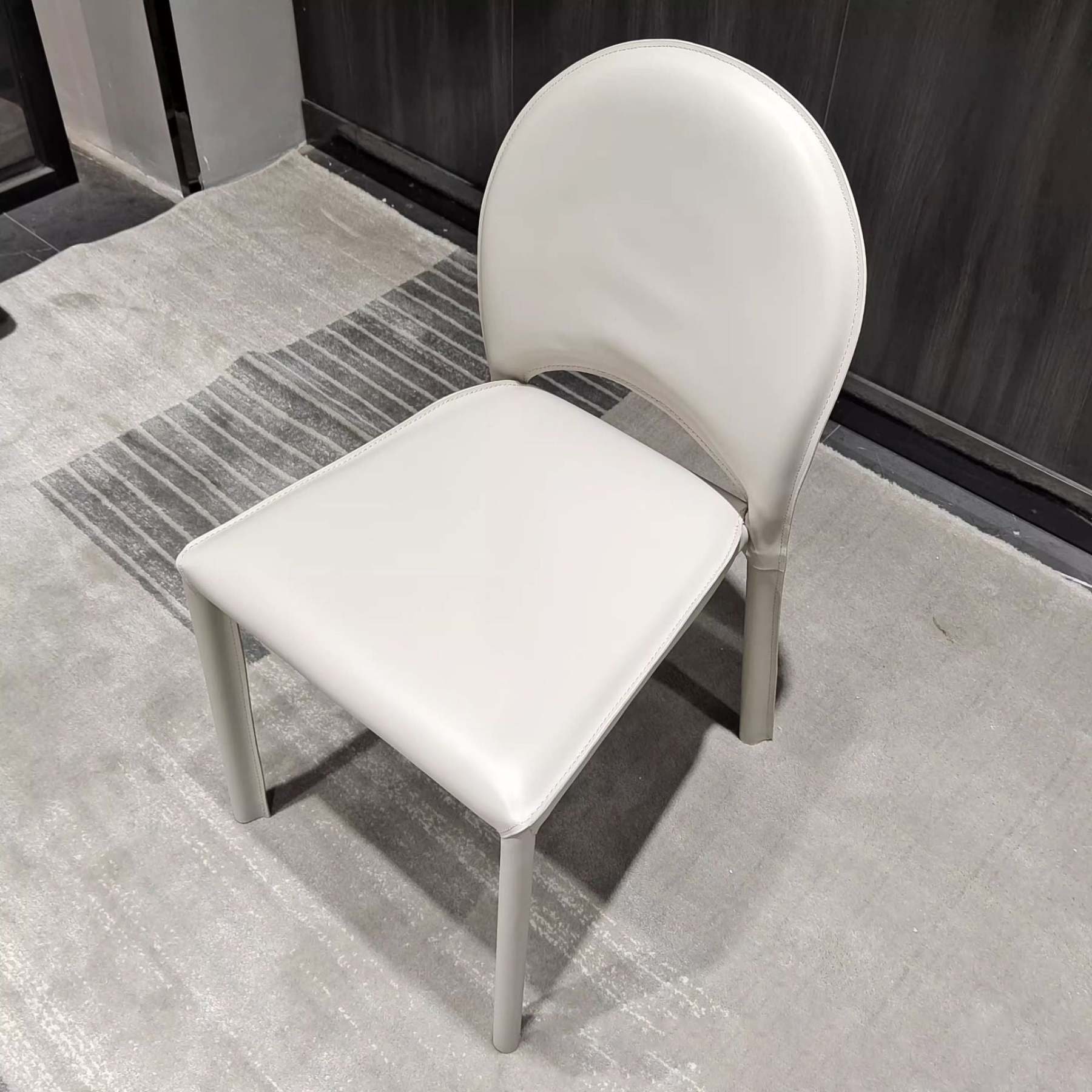 Minimalist Saddle Leather Steel Dining Chair